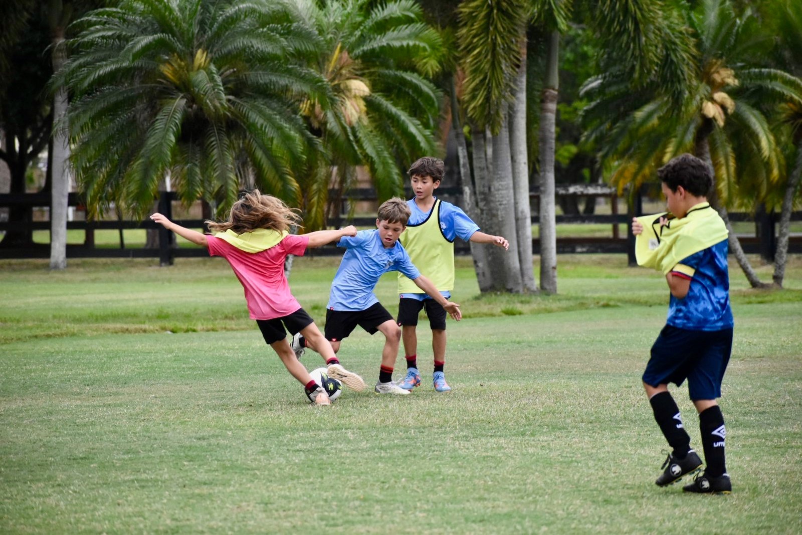 Children playing soccer