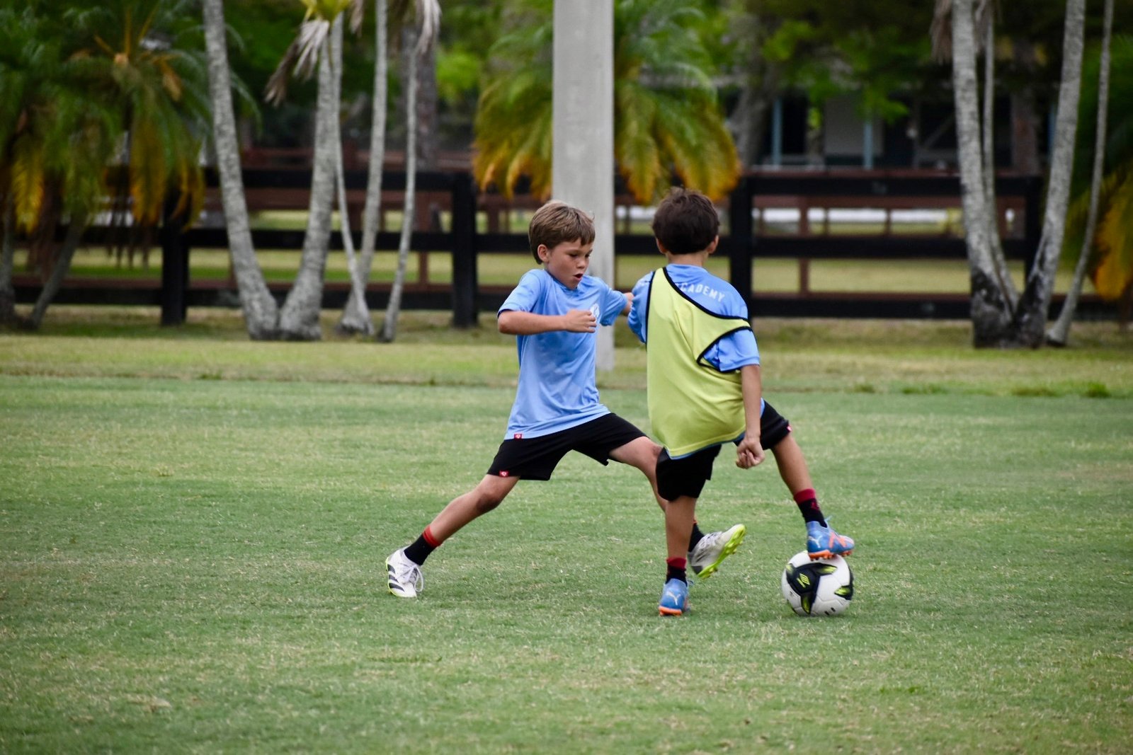 Another child playing soccer